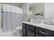 Cozy bathroom features a shower-tub combo with neutral colors at 2807 W Canada De Oro Rd, Queen Creek, AZ 85144