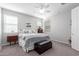 Bedroom with ceiling fan and natural light from two windows with blinds at 2807 W Canada De Oro Rd, Queen Creek, AZ 85144