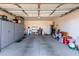 Spacious garage with ample storage cabinets and workspace at 2807 W Canada De Oro Rd, Queen Creek, AZ 85144