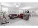 Cozy living room featuring tile floors, ceiling fan and neutral paint at 2807 W Canada De Oro Rd, Queen Creek, AZ 85144