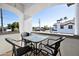 Cozy balcony with table and chairs offering neighborhood views at 2992 N Miller Rd # A202, Scottsdale, AZ 85251