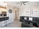 Comfortable living room featuring modern decor, neutral walls, and hardwood floors, seamlessly connecting to the kitchen area at 2992 N Miller Rd # A202, Scottsdale, AZ 85251