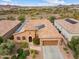 Beautiful home featuring solar panels, a two-car garage, and desert landscaping at 30110 N 129Th Gln, Peoria, AZ 85383