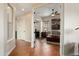 Hallway leading to living room with tile floors and neutral walls at 30110 N 129Th Gln, Peoria, AZ 85383