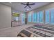 Main bedroom features large windows with shutters and a modern dresser at 30550 N 125Th Dr, Peoria, AZ 85383