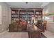 Office featuring built-in bookcase and desk at 30550 N 125Th Dr, Peoria, AZ 85383