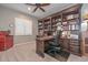 Office features built-in bookcase and desk at 30550 N 125Th Dr, Peoria, AZ 85383