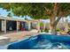 Inviting backyard featuring a hot tub and covered patio space perfect for entertaining at 3224 E Sweetwater Ave, Phoenix, AZ 85032