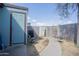 Outdoor patio featuring a shed, seating and a secure fenced perimeter at 3646 N 67Th Ave # 12, Phoenix, AZ 85033