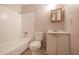 A bathroom featuring a shower/tub combo, a toilet, and a vanity with a mirror at 3646 N 67Th Ave # 12, Phoenix, AZ 85033