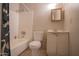 A full bathroom includes a shower-tub combo, vanity, and mirror offering essential functionality and space for personalization at 3646 N 67Th Ave # 12, Phoenix, AZ 85033