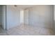 An empty bedroom provides a blank canvas for your design aspirations, featuring tile floors and neutral color at 3646 N 67Th Ave # 12, Phoenix, AZ 85033
