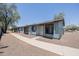 Quaint single-story townhouse with a secure entry gate and easy-to-maintain landscaping at 3646 N 67Th Ave # 12, Phoenix, AZ 85033