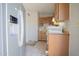 Functional kitchen with wooden cabinets, awaiting personalization and upgrades to suit your taste at 3646 N 67Th Ave # 12, Phoenix, AZ 85033