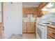 Classic kitchen with wooden cabinets, functional layout, and great potential for a modern makeover at 3646 N 67Th Ave # 12, Phoenix, AZ 85033