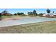 Community basketball court providing recreational facilities, surrounded by grassy areas and trees at 4338 E Towne Ln, Gilbert, AZ 85234