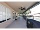 Covered patio with ceiling fans offering a serene outdoor living space with views of the pool at 4338 E Towne Ln, Gilbert, AZ 85234