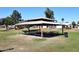 Community picnic area with covered tables, ideal for outdoor gatherings and neighborhood events at 4338 E Towne Ln, Gilbert, AZ 85234