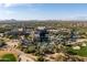 Expansive aerial view showcasing the resort's pools, landscaping, and golf course, blending luxury with natural beauty at 5350 E Deer Valley Dr # 1253, Phoenix, AZ 85054