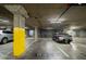 Spacious underground parking garage with assigned parking space and secure storage units at 5350 E Deer Valley Dr # 1253, Phoenix, AZ 85054