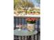 Inviting patio table set with wine glasses and appetizers, perfect for enjoying the outdoor scenery at 5350 E Deer Valley Dr # 1253, Phoenix, AZ 85054