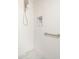 Modern shower with sleek tile, recessed niche, and grab bar at 5350 E Deer Valley Dr # 1253, Phoenix, AZ 85054