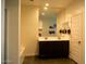 Modern bathroom featuring double sinks, vanity and mirror at 625 W Panola Dr, San Tan Valley, AZ 85140