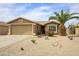 Charming single-story home with desert landscaping, two-car garage, and inviting curb appeal at 6390 S Granite Dr, Chandler, AZ 85249