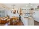 Bright eat-in kitchen featuring hardwood floors, pendant lighting, and ample counter space at 6390 S Granite Dr, Chandler, AZ 85249