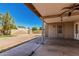 A backyard with a concrete patio and a large empty lot to fill with your dreams at 716 W Nopal Pl, Chandler, AZ 85225