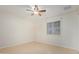 Bright bedroom with ceiling fan and light-colored wood-look flooring at 716 W Nopal Pl, Chandler, AZ 85225