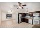 Kitchen boasts stainless steel appliances and a functional design with tile floors at 716 W Nopal Pl, Chandler, AZ 85225