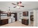 Kitchen featuring dark wood cabinetry and a window to the outside at 716 W Nopal Pl, Chandler, AZ 85225