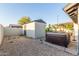 View of backyard featuring shed and hot tub at 756 E Appaloosa Rd, Gilbert, AZ 85296