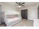Bedroom featuring a bunk bed and neutral decor with ample natural light at 756 E Appaloosa Rd, Gilbert, AZ 85296