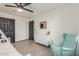 Bedroom featuring bunk beds, a teal chair and neutral decor with ample natural light at 756 E Appaloosa Rd, Gilbert, AZ 85296