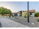 Single-story home featuring xeriscape desert landscaping and mature trees at 756 E Appaloosa Rd, Gilbert, AZ 85296