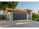 Charming single-story home with a gray garage door and well-maintained front yard at 756 E Appaloosa Rd, Gilbert, AZ 85296