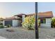 Single-story home featuring xeriscape desert landscaping and mature trees at 756 E Appaloosa Rd, Gilbert, AZ 85296