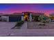 Charming single-story home with desert landscaping, inviting entryway, and attached garage, showcasing curb appeal at 756 E Appaloosa Rd, Gilbert, AZ 85296