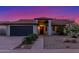 Charming single-story home with desert landscaping, inviting entryway, and attached garage, showcasing curb appeal at 756 E Appaloosa Rd, Gilbert, AZ 85296