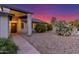 Charming single-story home featuring a well-maintained lawn and inviting entrance with a covered porch at 756 E Appaloosa Rd, Gilbert, AZ 85296