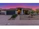 Charming single-story home featuring a well-maintained lawn, two car garage and inviting entrance at 756 E Appaloosa Rd, Gilbert, AZ 85296