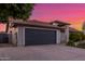 Charming single-story home featuring an expansive driveway and an attached two-car garage at 756 E Appaloosa Rd, Gilbert, AZ 85296