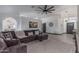 Elegant living room featuring a large sectional sofa, stylish decor, and an open floor plan, perfect for entertaining at 756 E Appaloosa Rd, Gilbert, AZ 85296