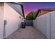 A small side yard has gravel cover and a trash receptacle at 756 E Appaloosa Rd, Gilbert, AZ 85296