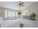 Bright main bedroom featuring a neutral color palette, vaulted ceilings, and an abundance of natural light at 8100 E Camelback Rd # 143, Scottsdale, AZ 85251