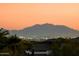 Mountain range and city lights seen from residence at dusk at 8147 E Redberry --, Mesa, AZ 85207