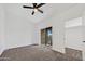 Bedroom featuring a ceiling fan and balcony with views at 10631 N 15Th Way # 4, Phoenix, AZ 85020
