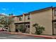 Lovely townhome exterior features desert landscape, carport, and well-maintained facade at 10631 N 15Th Way # 4, Phoenix, AZ 85020